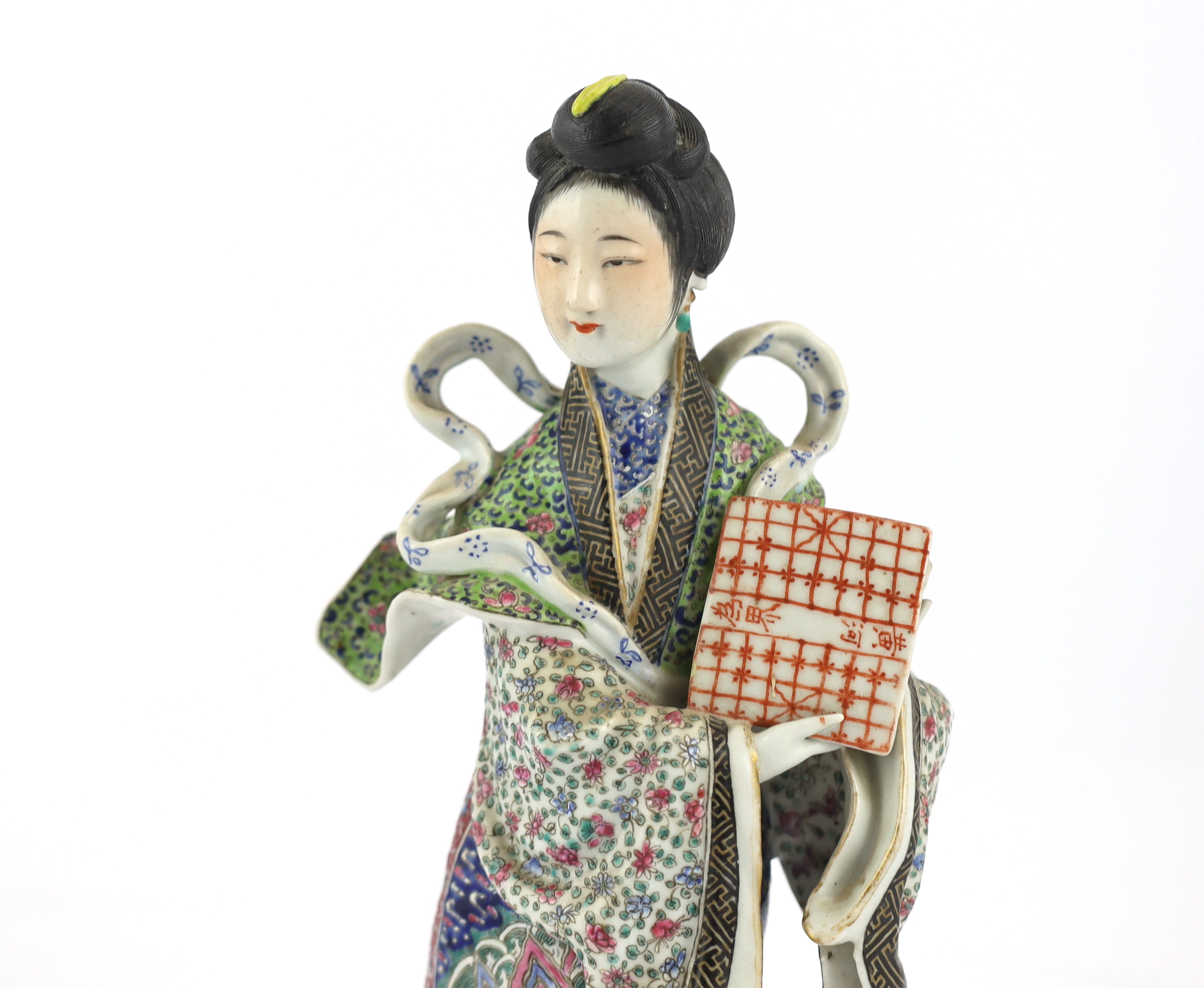A Chinese enamelled porcelain figure of a lady, Republic period, slight damage